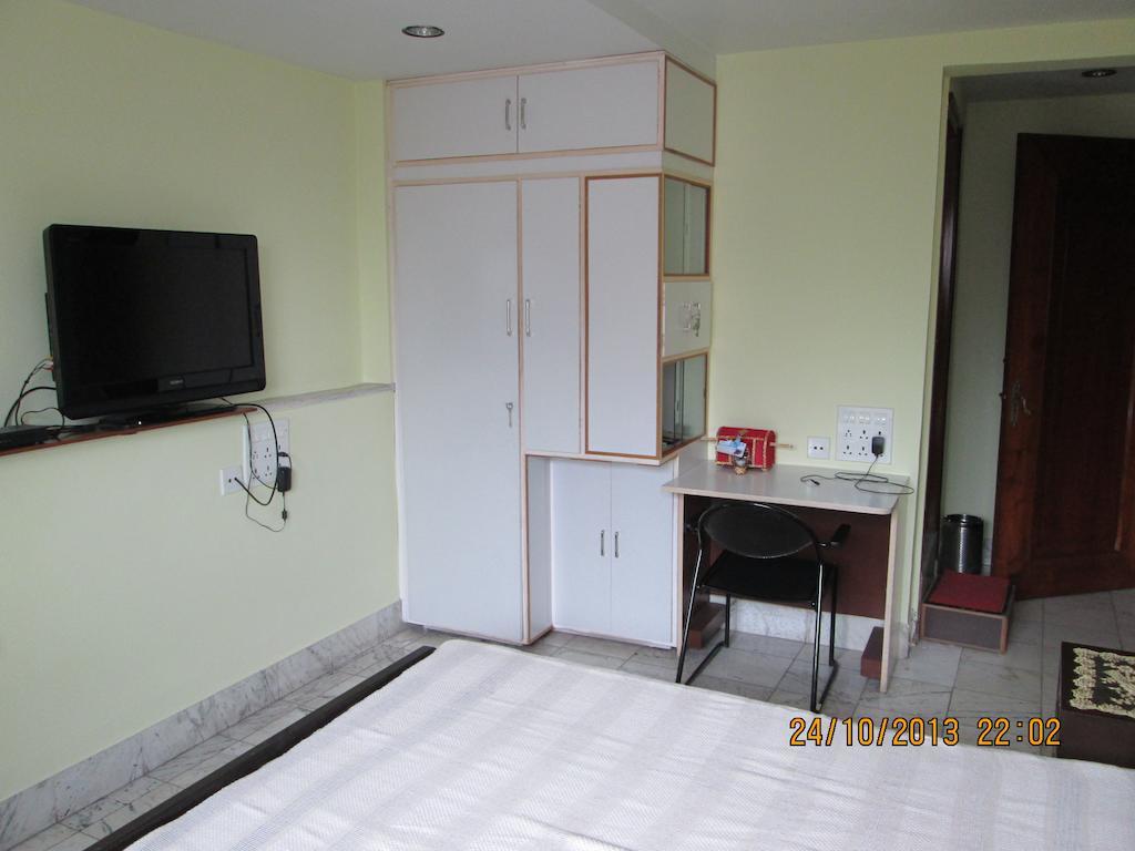 Service Apartments, Park Street, Calcutta Chambre photo